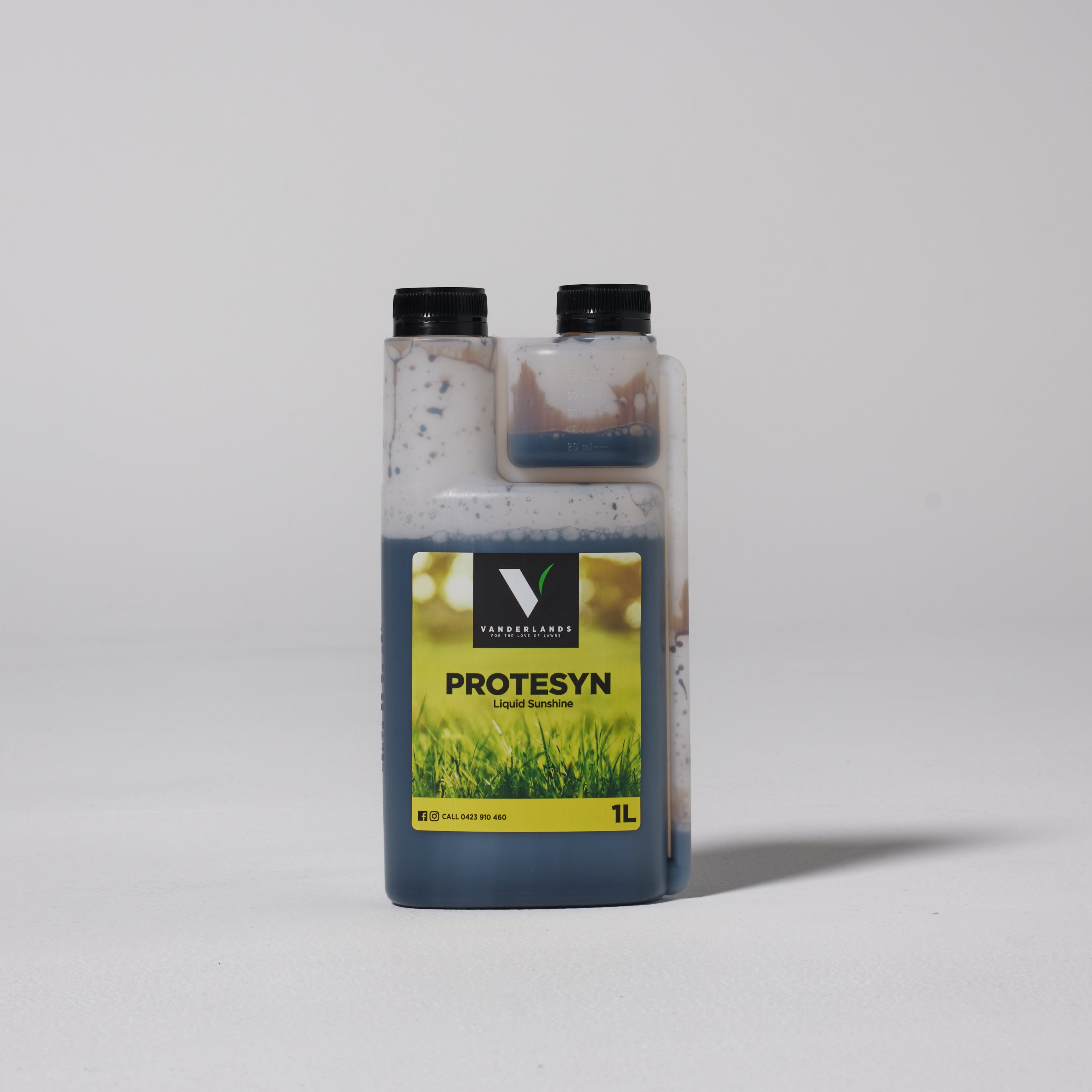 Bottle of Protesyn liquid fertilizer on a white background